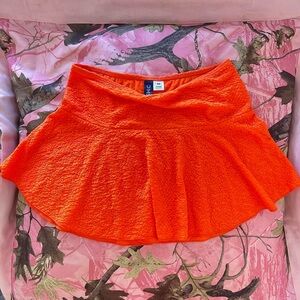 y2k neon orange mini skater skirt